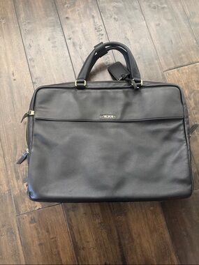 Tumi Black Leather Shoulder Bag/Laptop Briefcase with Gold Accents